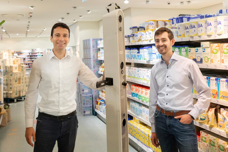 Georg Bartels (left) and Jonas Reiling, Managing Directors at Ubica Robotics, demonstrate their scanning robot in a branch of a chemists chain in Bremen. Georg Bartels (left) and Jonas Reiling, Managing Directors at Ubica Robotics, demonstrate their scanning robot in a branch of a chemists chain in Bremen.