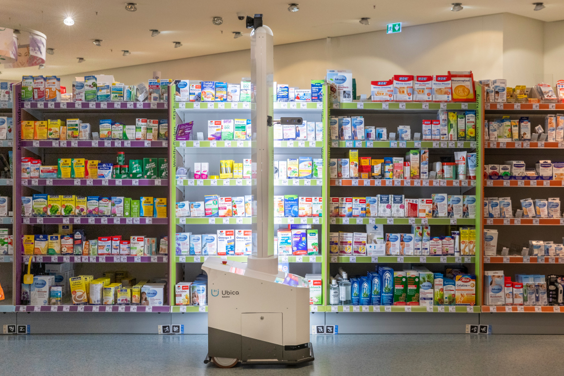 After the shop is closed for the night, the robot moves through the aisles checking stock levels on the shelves