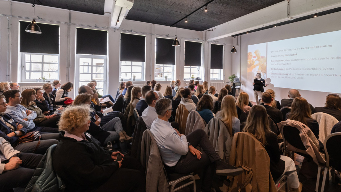 People listening to a presentation