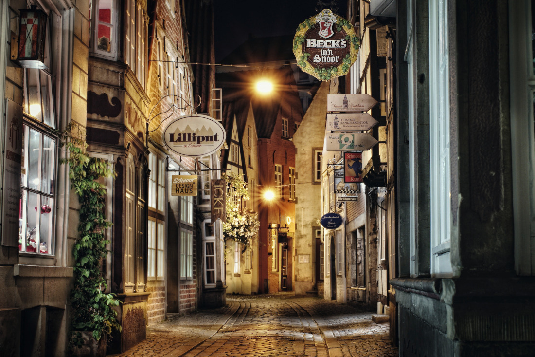 As darkness falls, the winding lanes of the Schnoor quarter take on a charm of their own. As darkness falls, the winding lanes of the Schnoor quarter take on a charm of their own.