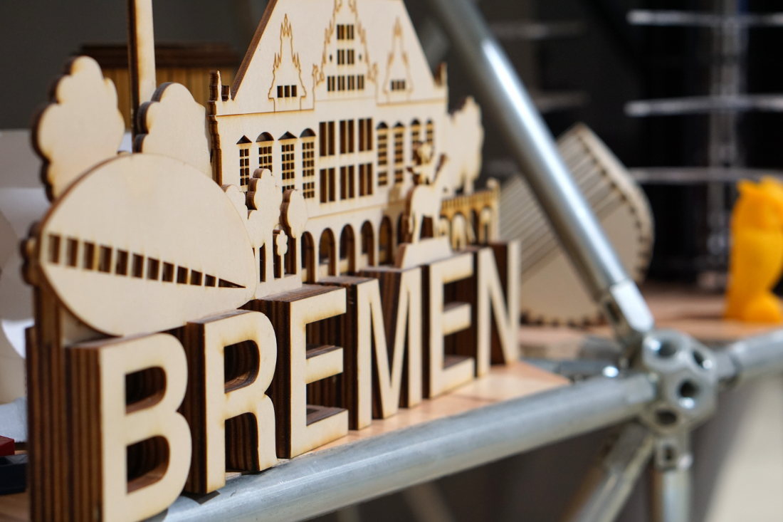 A laser-cut cityscape