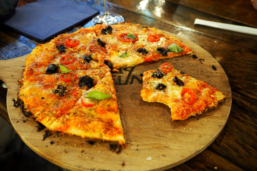 Pizza on wooden board