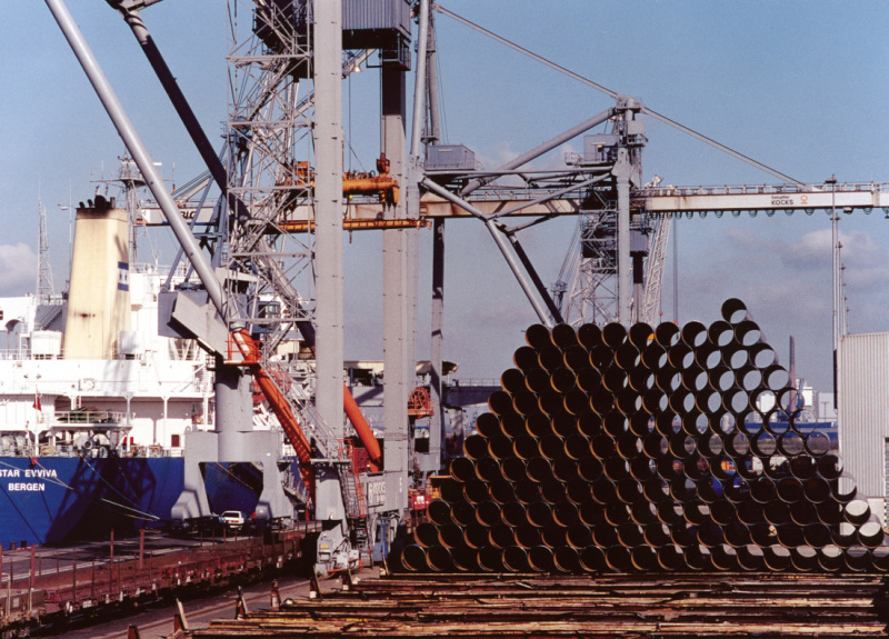 Transshipping pipes in Neustadt port. Transshipping pipes in Neustadt port.